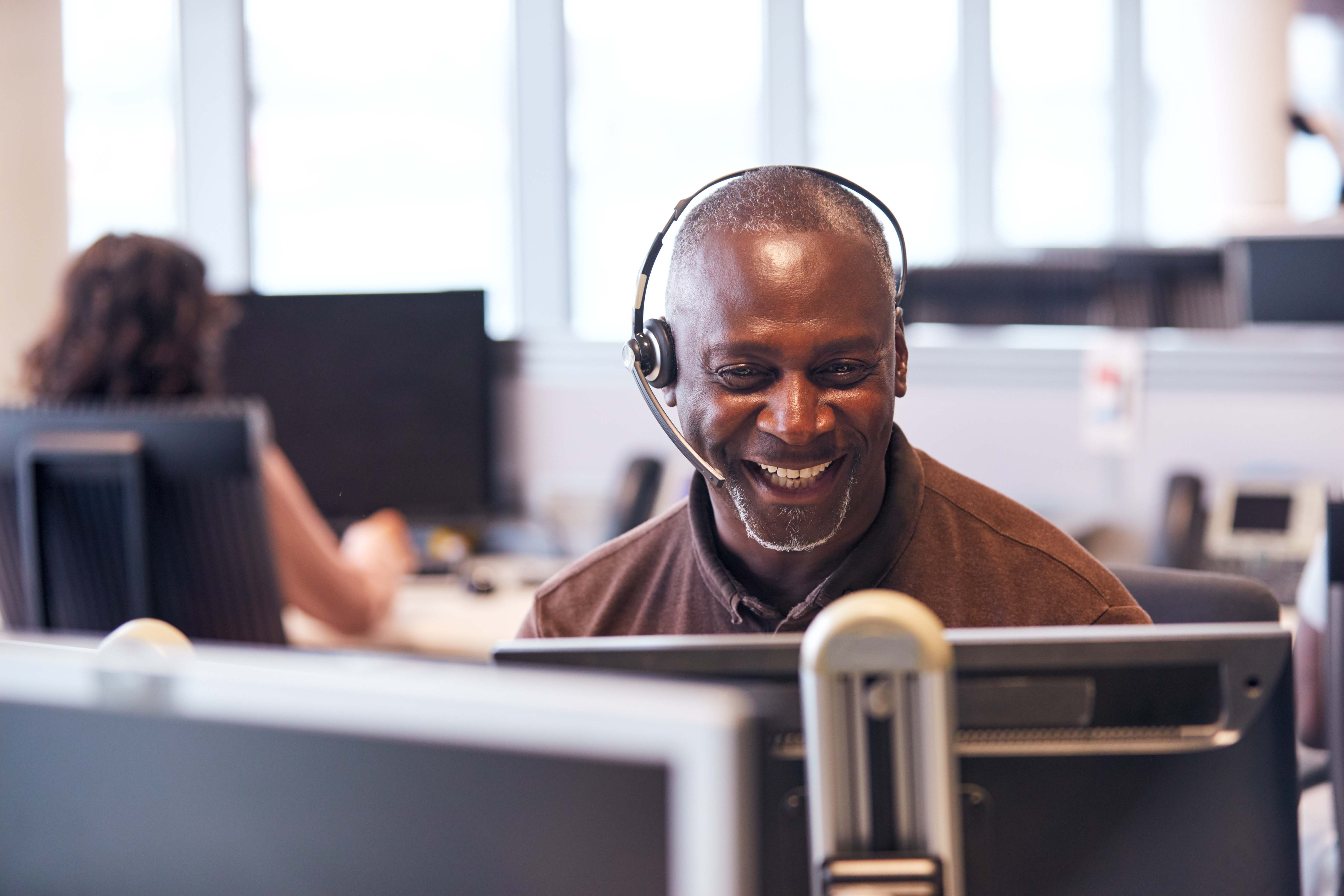 Wearing Telephone Headset In Customer Services Department