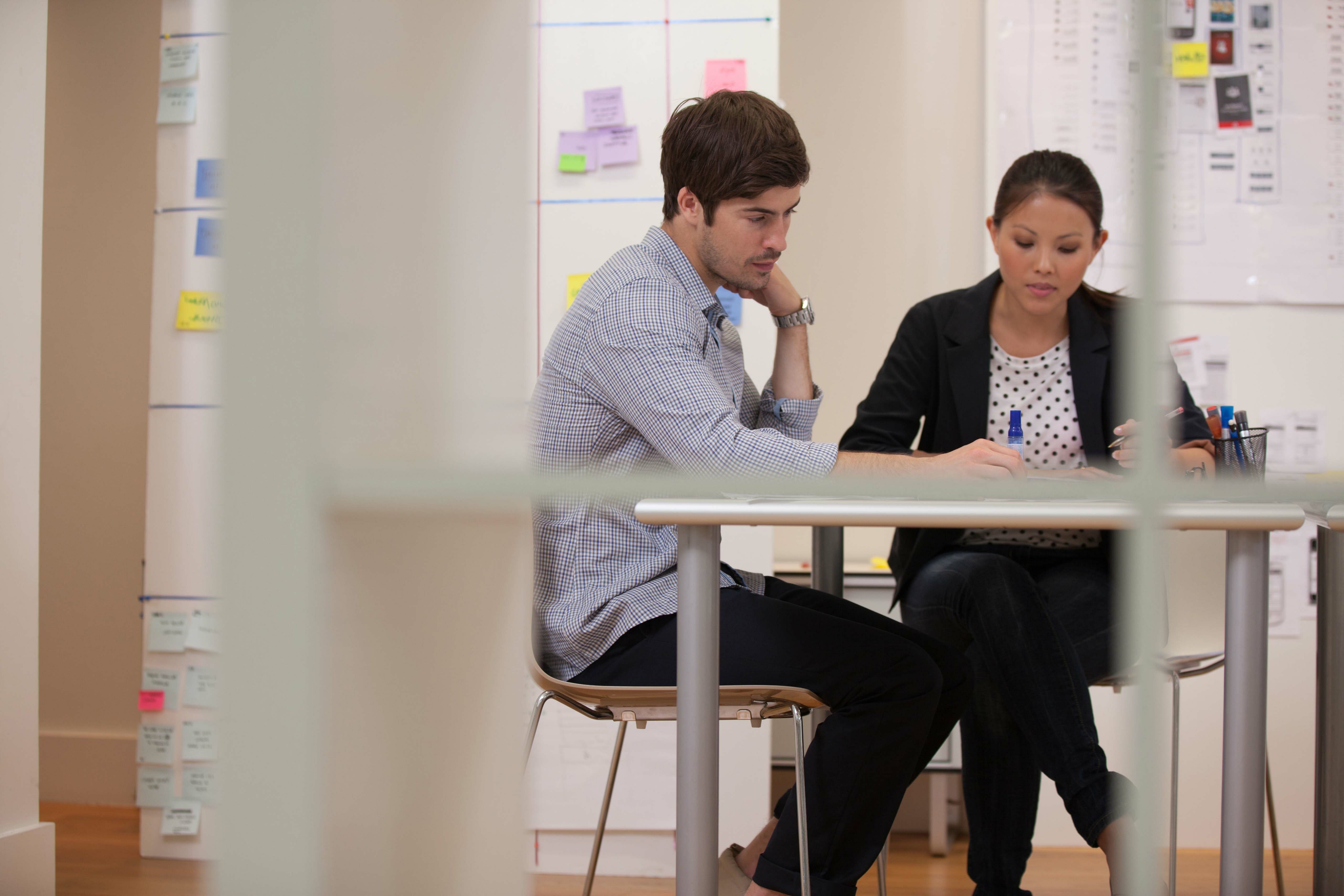 Team collaboration in office meeting room