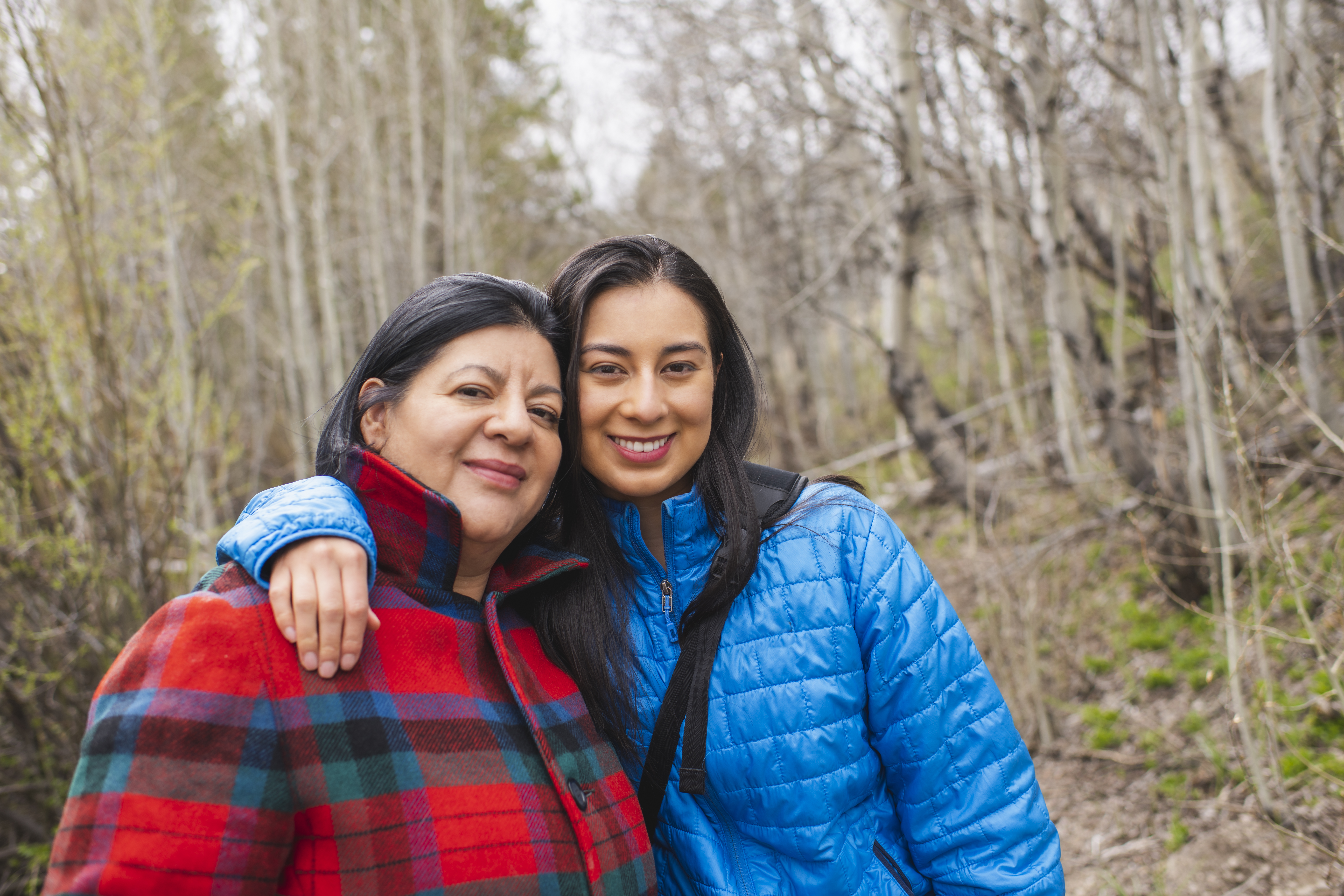 Mother and adult daughter hiking